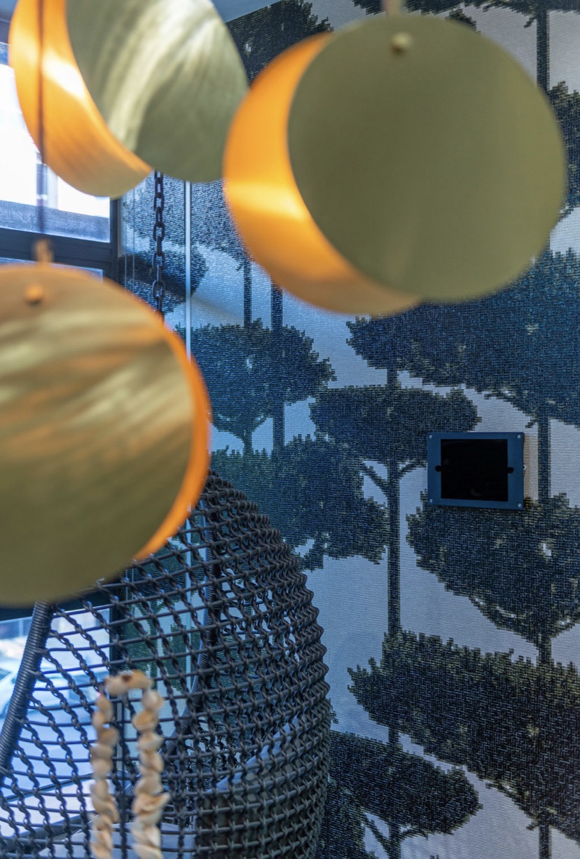 Interior detail with pendant lighting and woven textures